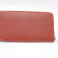 Pre-Owned Hermes HERMES Round Zipper Long Wallet Azap Silk In Leather Brown x Orange Silver Women's (Good)